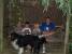 Husse med hundar och en sjoker ungar vid Norrvikens tr�dg�rdar